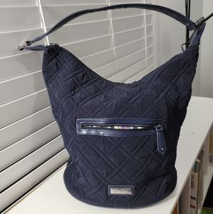 Vera Bradley solid navy color shoulder bag in like new condition. Leather bottom
